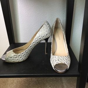 Peep toe silver pumps
